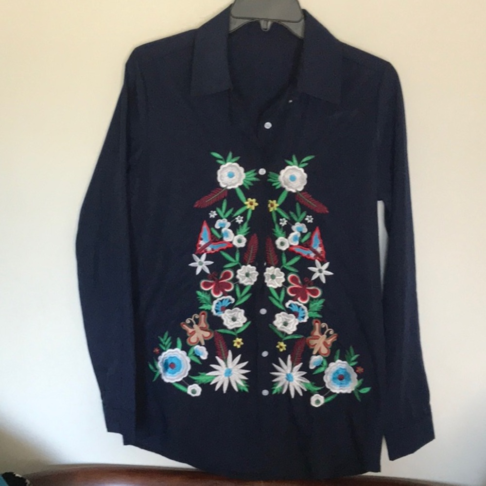 Beautiful embroidered floral design on navy blue.